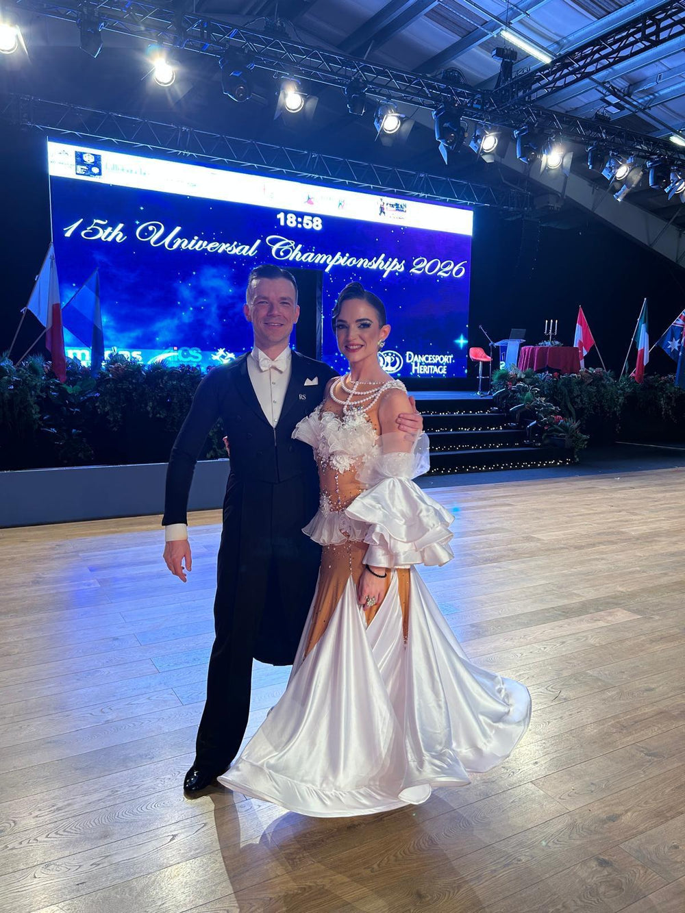 Dancers on a stage at the 15th Universal Championships 2021 event.