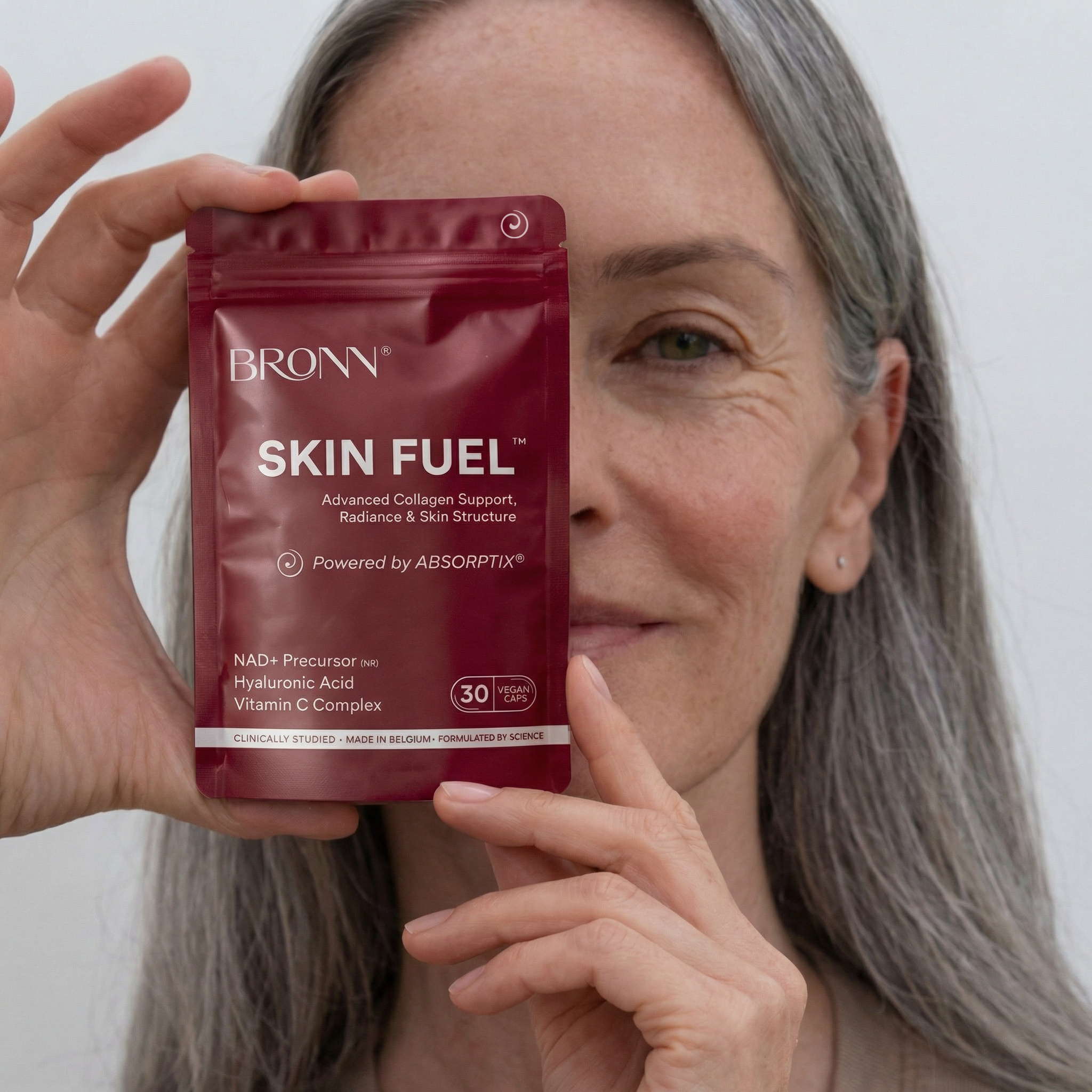 Woman holding SKIN FUEL